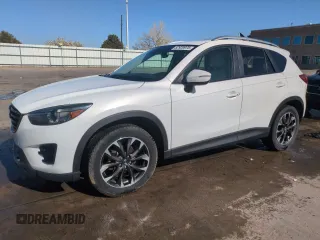 2016 Mazda CX-5 Grand Touring with VIN JM3KE4DY8G0671256, listed as a Copart auction lot 52920975 with 87,822 mi miles and Non Repairable. Bid and sale history available at carsss.com. Image 1.