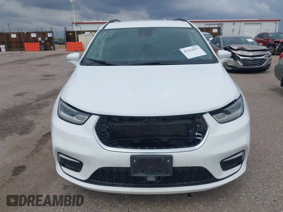 2022 Chrysler Pacifica Touring L with VIN 2C4RC1BG5NR170186, listed as a IAAI auction lot 41422057 with 71,204 mi miles and . Bid and sale history available at DreamBid. Image 12.