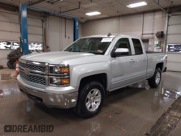 2015 Chevrolet Silverado 1500 LT with VIN 1GCVKREH5FZ271451, listed as a IAAI auction lot 42040083 with 262,135 mi miles and . Bid and sale history available at DreamBid. Image 2.