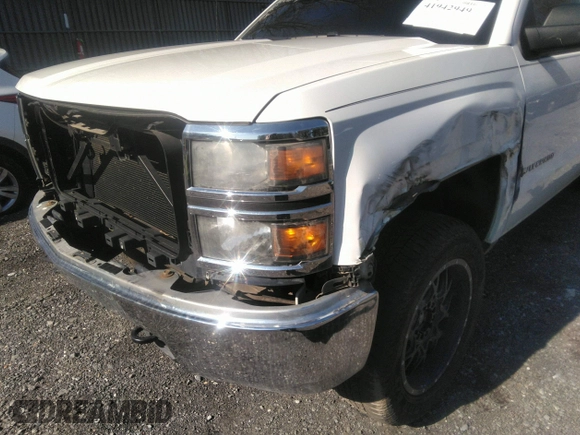 2014 Chevrolet Silverado 1500 LT with VIN 1GCVKREH4EZ148979, listed as a IAAI auction lot 41942949 with 193,710 mi miles and . Bid and sale history available at DreamBid. Image 6.