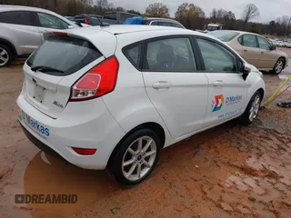 2016 Ford Fiesta SE with VIN 3FADP4EJ2GM157810, listed as a IAAI auction lot 41011326 with 214,609 mi miles. Bid and sale history available at carsss.com. Image 4.