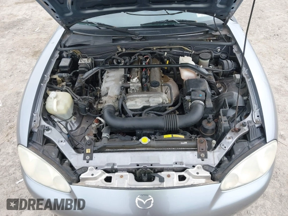 2002 Mazda MX-5 Miata Cloth z VIN JM1NB353X20227591, wystawiony jako IAAI lot #42066430 z przebiegiem 79 585 mil mil oraz . Historia ofert i sprzedaży dostępna na DreamBid. Obrazek 10.