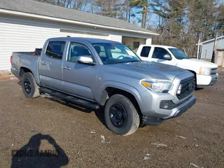 2021 Toyota Tacoma 4WD SR with VIN 3TMCZ5AN2MM380875, listed as a IAAI auction lot 41640941 with 69,659 mi miles. Bid and sale history available at carsss.com. Image 1.