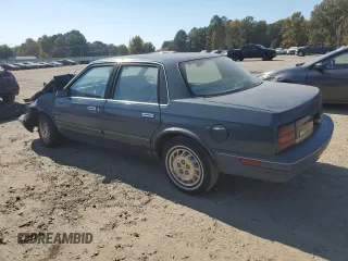 1996 Oldsmobile Cutlass Ciera 1SA VX5 z VIN 1G3AJ55M2T6328418, wystawiony jako Copart lot #77411634 z przebiegiem 29 918 mil mil oraz Szkody całkowita. Historia ofert i sprzedaży dostępna na DreamBid. Obrazek 2.