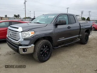 2014 Toyota Tundra SR with VIN 5TFUM5F16EX052444, listed as a Copart auction lot 64684575 with 121,876 mi miles and Salvage title. Bid and sale history available at DreamBid. Image 1.