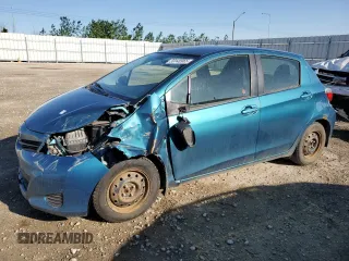 2012 Toyota Yaris L z VIN JTDKTUD32CD523898, wystawiony jako Copart lot #59148965 z przebiegiem 196 822 mil mil oraz Szkoda całkowita • Salvage title. Historia ofert i sprzedaży dostępna na DreamBid. Obrazek 1.