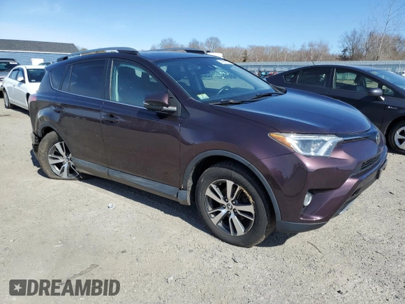 2018 Toyota RAV4 XLE with VIN 2T3RFREVXJW851654, listed as a Copart auction lot 48961055 with 166,664 mi miles and Salvage Title. Bid and sale history available at DreamBid. Image 4.