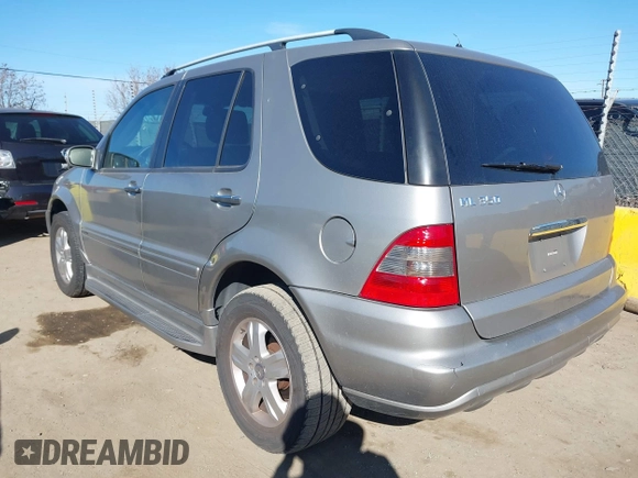 2005 Mercedes-Benz M 350 with VIN 4JGAB57E65A550801, listed as a IAAI auction lot 41669539 with 207,572 mi miles and . Bid and sale history available at DreamBid. Image 3.