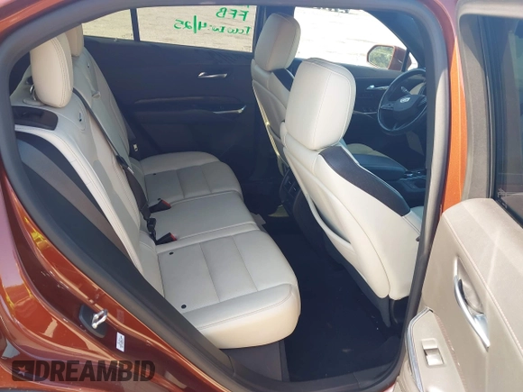 2019 Cadillac XT4 FWD Sport z VIN 1GYFZER4XKF103780, wystawiony jako IAAI lot #42171306 z przebiegiem 99 260 mil mil oraz . Historia ofert i sprzedaży dostępna na DreamBid. Obrazek 8.