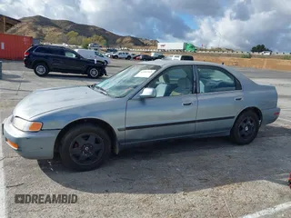 1996 Honda Accord LX with VIN 1HGCD5634TA291036, listed as a IAAI auction lot 41583543 with 166,725 mi miles and . Bid and sale history available at carsss.com. Image 14.