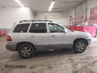 2004 Hyundai Santa Fe GLS with VIN KM8SC13E44U797943, listed as a IAAI auction lot 41731356 with 184,139 mi miles. Bid and sale history available at carsss.com. Image 13.