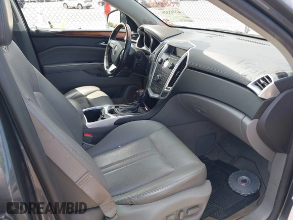 2012 Cadillac SRX Luxury Collection z VIN 3GYFNAE30CS531551, wystawiony jako IAAI lot #42215326 z przebiegiem 226 927 mil mil oraz . Historia ofert i sprzedaży dostępna na DreamBid. Obrazek 5.