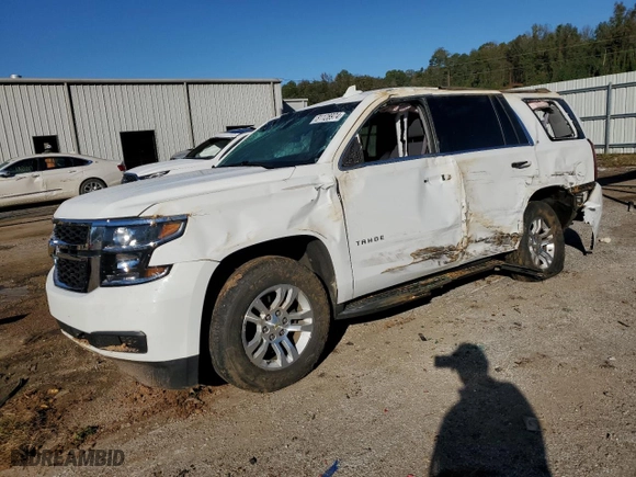 2015 Chevrolet Tahoe LS with VIN 1GNSKAKCXFR546803, listed as a Copart auction lot 81128974 with 131,482 mi miles and Salvage Title. Bid and sale history available at carsss.com. Image 1.