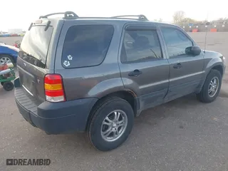 2006 Ford Escape XLT with VIN 1FMYU93126KC04632, listed as a IAAI auction lot 41912068 with 133,216 mi miles. Bid and sale history available at carsss.com. Image 4.