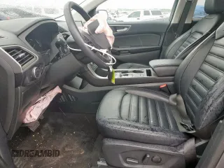 2024 Ford Edge SEL z VIN 2FMPK4J97RBA98092, wystawiony jako Copart lot #52000715 z przebiegiem 23 845 mil mil oraz Szkoda całkowita • Salvage title. Historia ofert i sprzedaży dostępna na DreamBid. Obrazek 7.