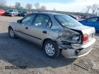 2000 Honda Civic LX with VIN 1HGEJ6679YL066102, listed as a IAAI auction lot 41585270 with 164,714 mi miles. Bid and sale history available at carsss.com. Image 3.