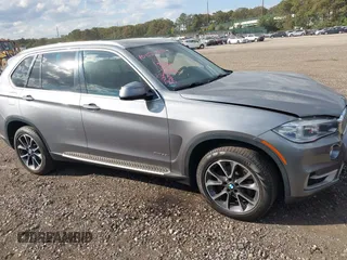2014 BMW X5 xDrive35i with VIN 5UXKR0C52E0K50710, listed as a IAAI auction lot 40529606 with 114,307 mi miles. Bid and sale history available at carsss.com. Image 13.