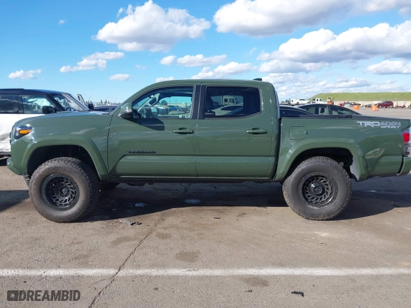 2021 Toyota Tacoma 4WD SR with VIN 3TMCZ5AN4MM401998, listed as a IAAI auction lot 41712813 with 91,371 mi miles. Bid and sale history available at carsss.com. Image 15.