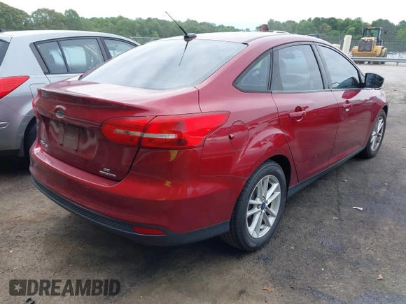 2015 Ford Focus SE with VIN 1FADP3F22FL259223, listed as a IAAI auction lot 42333439 with 77,111 mi miles and . Bid and sale history available at DreamBid. Image 4.