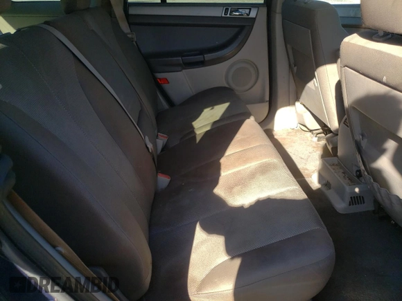2006 Chrysler Pacifica z VIN 2A8GM48436R695485, wystawiony jako Copart lot #47012185 z przebiegiem 153 659 mil mil oraz Szkoda całkowita • Salvage title. Historia ofert i sprzedaży dostępna na DreamBid. Obrazek 12.