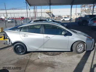 2019 Toyota Prius L Eco with VIN JTDKARFU3K3082893, listed as a IAAI auction lot 41370727 with 217,582 mi miles. Bid and sale history available at carsss.com. Image 14.