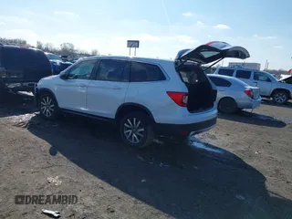 2021 Honda Pilot EX-L with VIN 5FNYF5H57MB037861, listed as a IAAI auction lot 41566924 with 42,867 mi miles. Bid and sale history available at carsss.com. Image 3.