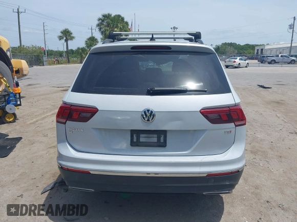 2018 Volkswagen Tiguan SEL with VIN 3VV3B7AX4JM201878, listed as a IAAI auction lot 42083809 with 115,956 mi miles and . Bid and sale history available at DreamBid. Image 17.