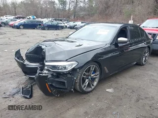 2020 BMW 5 Series M550i xDrive z VIN WBAJS7C09LCD45078, wystawiony jako IAAI lot #41850274 z przebiegiem 75 613 mil mil oraz . Historia ofert i sprzedaży dostępna na DreamBid. Obrazek 17.