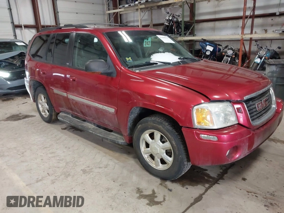 2003 GMC Envoy SLT with VIN 1GKDT13SX32134944, listed as a IAAI auction lot 41498519 with 149,640 mi miles. Bid and sale history available at carsss.com. Image 1.