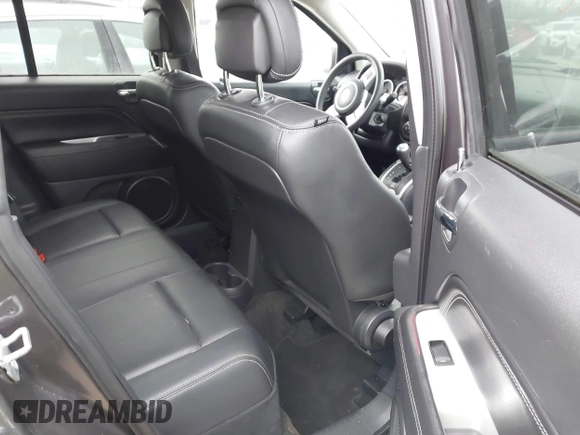 2016 Jeep Compass High Altitude Edition with VIN 1C4NJCEAXGD760221, listed as a IAAI auction lot 41486540 with 104,900 mi miles. Bid and sale history available at carsss.com. Image 8.