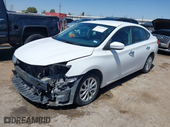 2019 Nissan Sentra S z VIN 3N1AB7AP5KY285776, wystawiony jako IAAI lot #41969976 z przebiegiem 87 187 mil mil oraz . Historia ofert i sprzedaży dostępna na DreamBid. Obrazek 19.