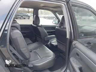 2005 Honda CR-V EX SE with VIN JHLRD789X5C004752, listed as a IAAI auction lot 42057724 with 243,631 mi miles. Bid and sale history available at carsss.com. Image 8.