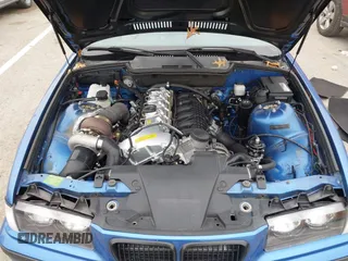 1999 BMW 3 Series M3 with VIN WBSBG9336XEY80979, listed as a IAAI auction lot 41179676 with 262,233 mi miles. Bid and sale history available at carsss.com. Image 10.