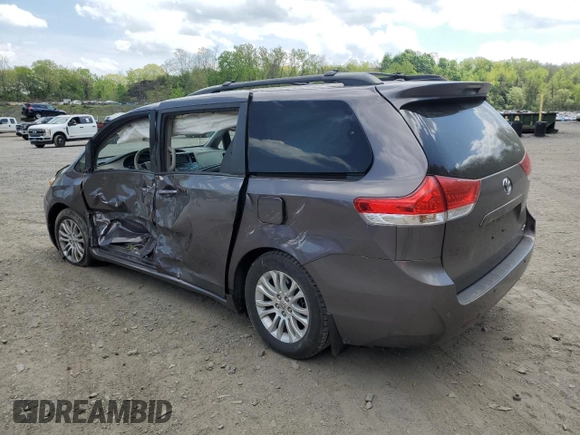 2012 Toyota Sienna XLE AAS with VIN 5TDYK3DC6CS248919, listed as a Copart auction lot 55470505 with 79,761 mi miles and Salvage title. Bid and sale history available at DreamBid. Image 2.
