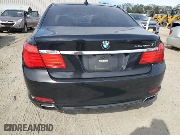2011 BMW 7 Series with VIN WBAKX8C52BC198377, listed as a Copart auction lot 70003444 with 173,725 mi miles and Salvage title. Bid and sale history available at DreamBid. Image 6.