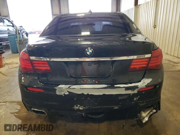 2014 BMW 7 Series ALPINA B7 xDrive with VIN WBAYF8C53ED652566, listed as a Copart auction lot 61177235 with 144,566 mi miles and Salvage title. Bid and sale history available at DreamBid. Image 6.