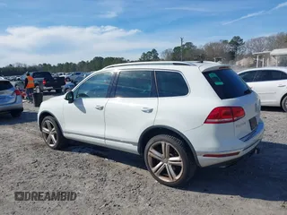 2016 Volkswagen Touareg Sport with VIN WVGEF9BP5GD012680, listed as a IAAI auction lot 41610943 with 153,952 mi miles and . Bid and sale history available at DreamBid. Image 3.