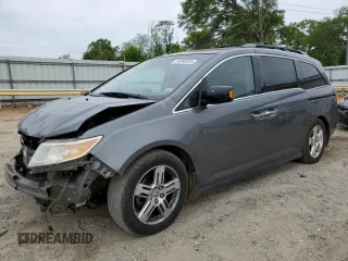 2012 Honda Odyssey Touring with VIN 5FNRL5H96CB045514, listed as a Copart auction lot 54698355 with 217,787 mi miles and Clean Title. Bid and sale history available at carsss.com. Image 1.