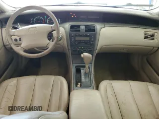 2000 Toyota Avalon XL with VIN 4T1BF28B9YU112742, listed as a Copart auction lot 54719355 with 213,896 mi miles and Salvage Title. Bid and sale history available at DreamBid. Image 8.
