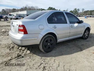 2004 Volkswagen Jetta GLS with VIN 3VWSR69M24M123449, listed as a Copart auction lot 48115325 with 302,443 mi miles and Salvage title. Bid and sale history available at DreamBid. Image 3.