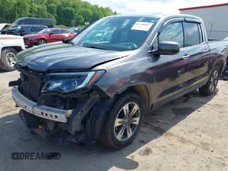 2018 Honda Ridgeline RTL-E with VIN 5FPYK3F74JB004162, listed as a IAAI auction lot 42180687 with 160,805 mi miles and . Bid and sale history available at DreamBid. Image 23.