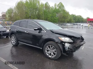 2009 Mazda CX-7 Grand Touring with VIN JM3ER29L290223228, listed as a IAAI auction lot 41976054 with 118,936 mi miles. Bid and sale history available at carsss.com. Image 1.
