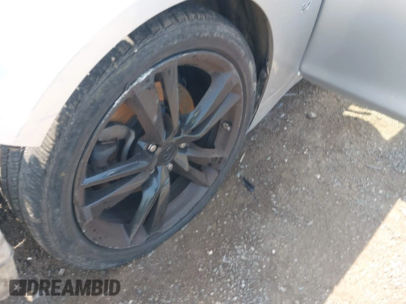 2015 Infiniti Q50 with VIN JN1BV7AP6FM354690, listed as a IAAI auction lot 42410614 with 98,527 mi miles and . Bid and sale history available at DreamBid. Image 12.