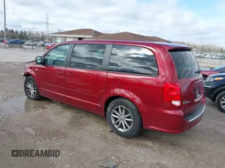 2014 Dodge Grand Caravan SE with VIN 2C4RDGBG6ER187868, listed as a IAAI auction lot 41949644 with 156,937 mi miles and . Bid and sale history available at DreamBid. Image 3.