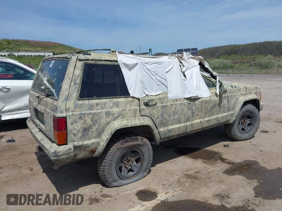 1996 Jeep Cherokee Sport with VIN 1J4FJ68S2TL154142, listed as a IAAI auction lot 42116515 with 197,095 mi miles and . Bid and sale history available at DreamBid. Image 4.