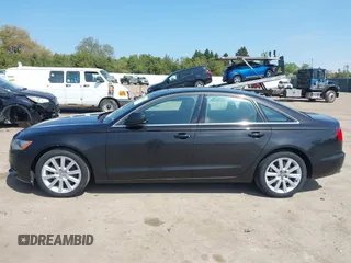 2013 Audi A6 Premium Plus с VIN WAUDFAFC2DN081032, выставлен на аукционе IAAI как лот 42212563 с пробегом 131 601 миль миль и . История ставок и продаж доступна на DreamBid. Изображение 14.