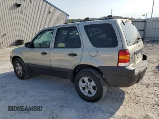 2005 Ford Escape XLT with VIN 1FMYU03115KA43989, listed as a Copart auction lot 69295484 with 160,309 mi miles and Salvage Title. Bid and sale history available at carsss.com. Image 2.