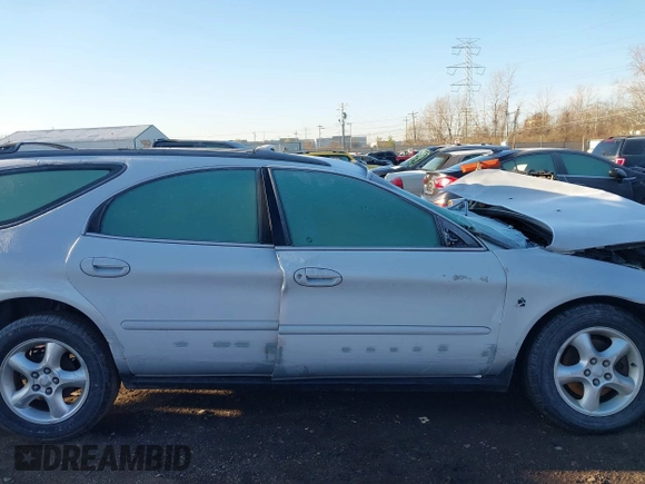 2001 Ford Taurus SE Standard z VIN 1FAFP582X1G268769, wystawiony jako IAAI lot #41837093 z przebiegiem 42 261 mil mil oraz . Historia ofert i sprzedaży dostępna na DreamBid. Obrazek 13.