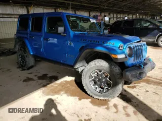 2023 Jeep Wrangler Rubicon with VIN 1C4JJXR6XPW541520, listed as a Copart auction lot 48265415 with 37,987 mi miles and Salvage title. Bid and sale history available at DreamBid. Image 4.
