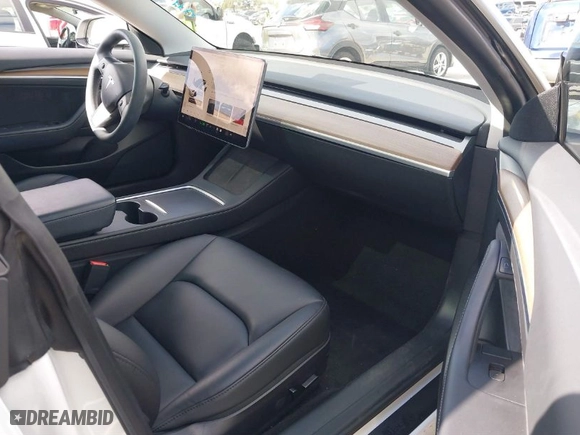 2023 Tesla Model 3 with VIN 5YJ3E1EA6PF488405, listed as a IAAI auction lot 41570896 with 26,631 mi miles. Bid and sale history available at carsss.com. Image 5.